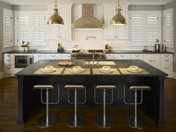 Black Kitchen Island decoration with white cabinets and light wood floor