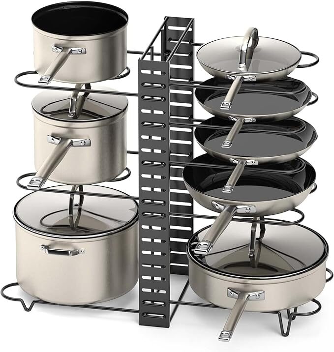 Vertical pot and pan rack organizer in a kitchen cabinet