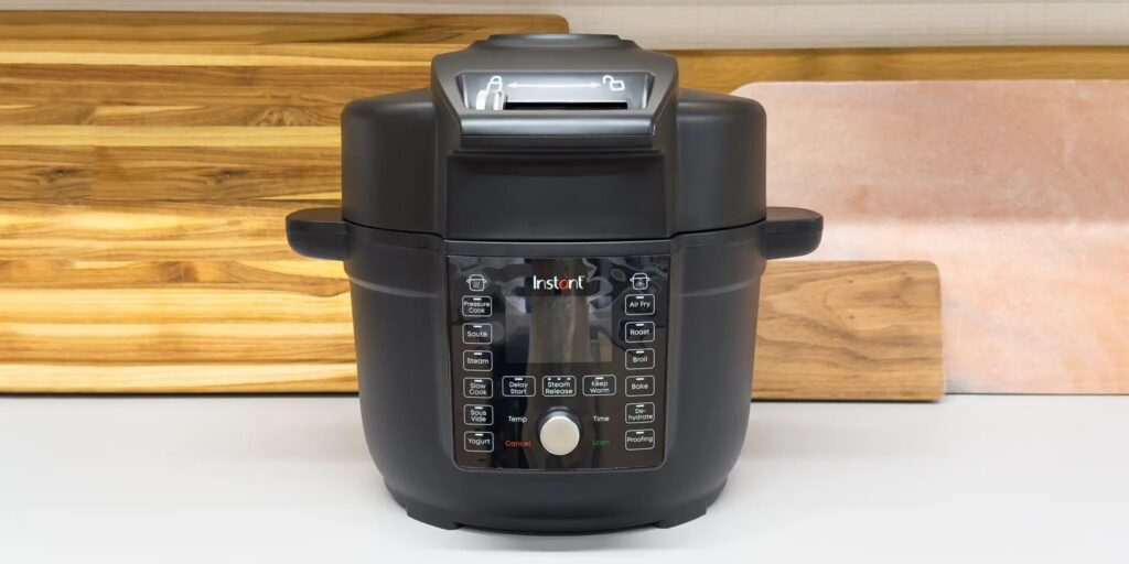 Instant Pot Duo Crisp pressure cooker with air fryer lid on kitchen counter